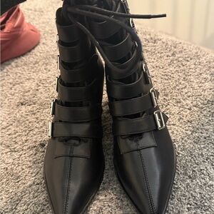 Elegant Black Strappy Heeled Boots